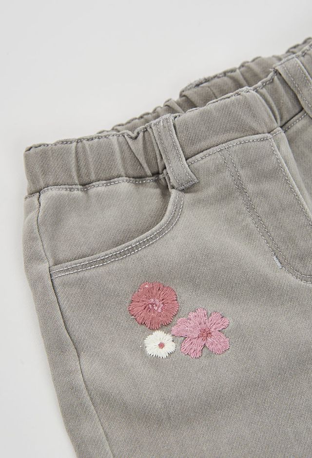 Denim con ricami orchidea