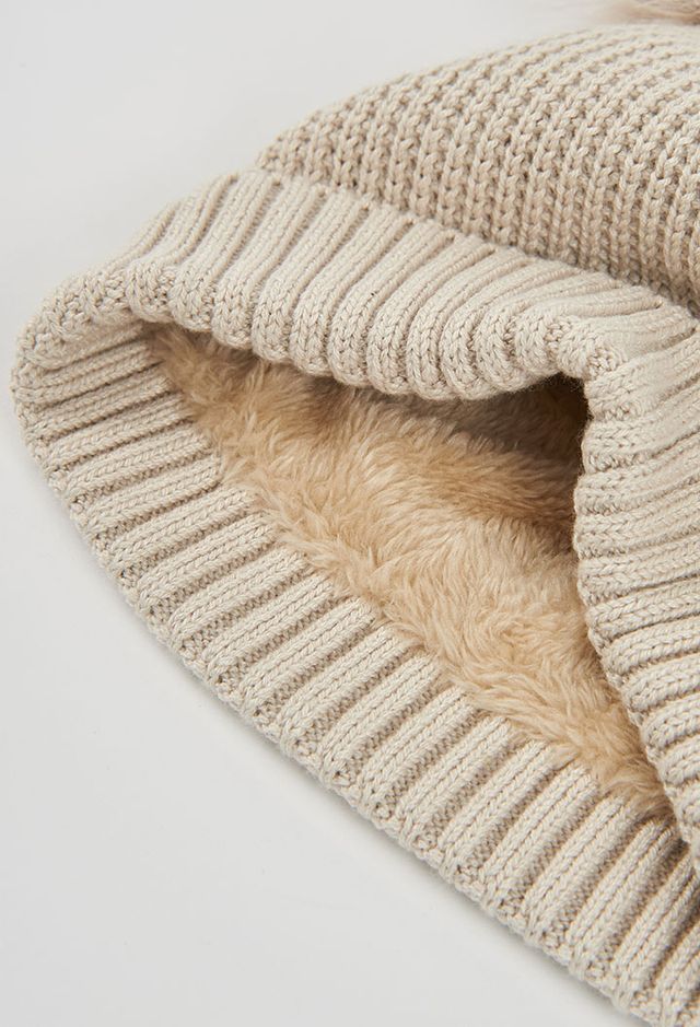 Cappello in lana con pompon