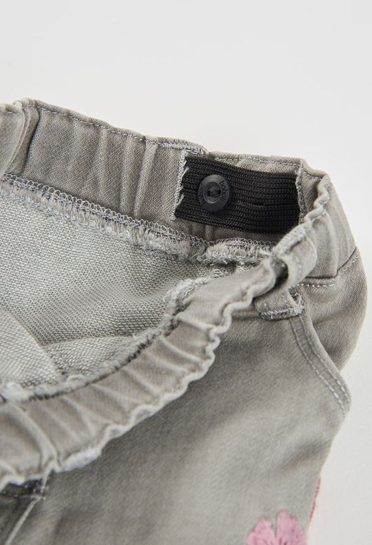 Denim con ricami orchidea